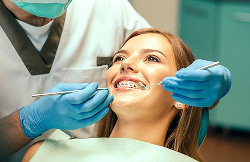 a patient with braces during an appointment