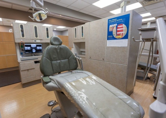 Man with short beard smiling in dental chair at West Jordan dental office