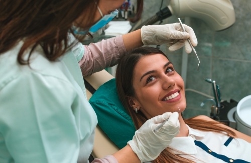 Young woman smiling during a dental checkup