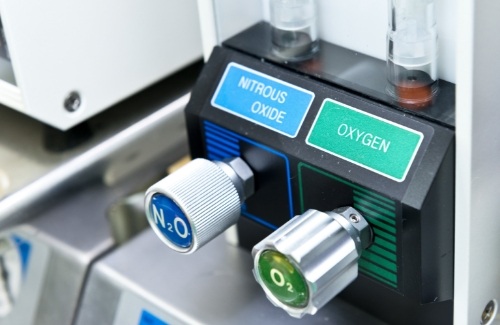 Buttons on machine in dental treatment room that say nitrous oxide and oxygen