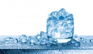Glass cup full of ice
